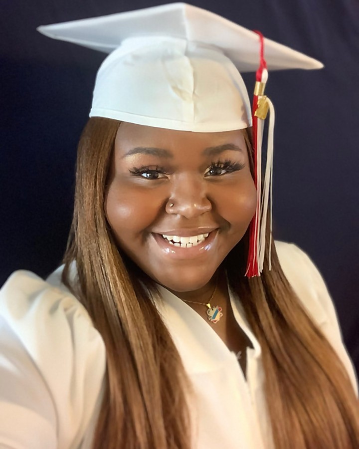 A graduate celebrated by The Order of the Lamp
